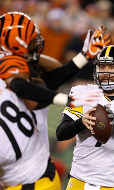 NFL Latest: Bengals struggling minus Andy Dalton